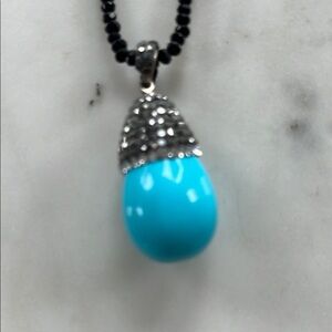 Elegant Silver and Turquoise Pendant Necklace